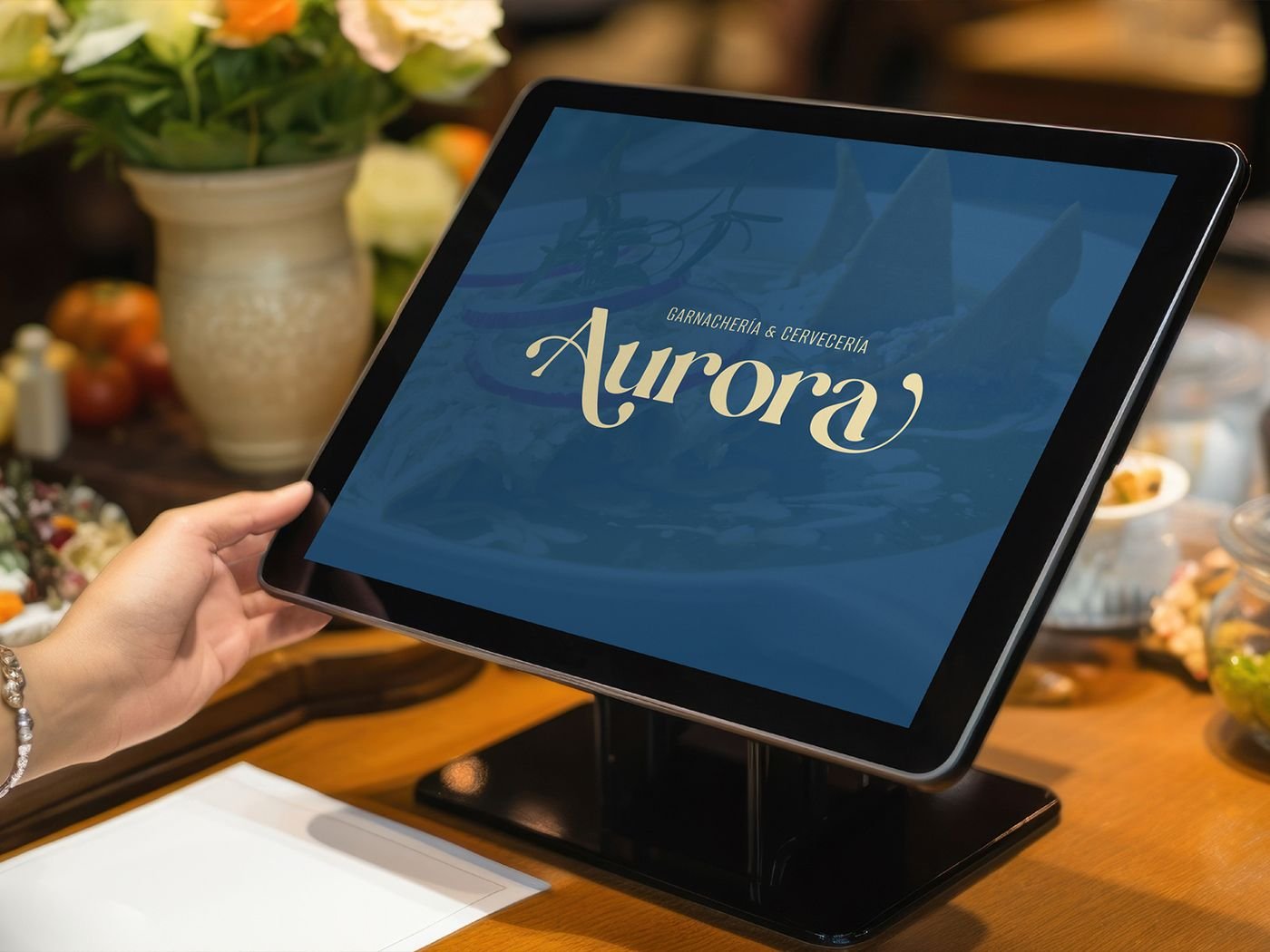 Logotipo de Aurora en la pantalla de un punto de venta
